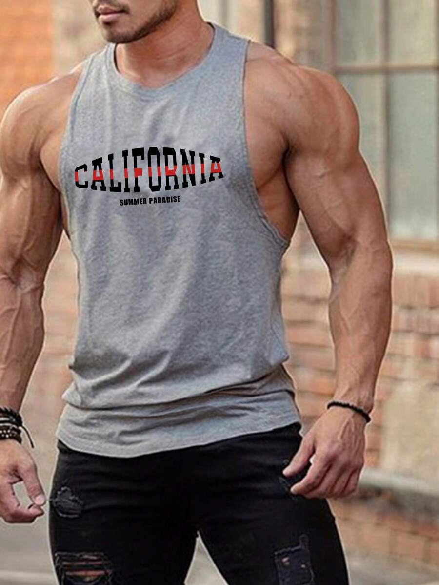 Manfinity Fitness Camiseta de tirantes deportiva con estampado de letras de estilo boyfriend para hombre, top transpirable para entrenamiento en el gimnasio - Gris - Ver 1