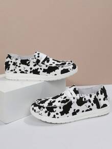 女性黑色和白色奶牛圖案前綁帶休閒鞋