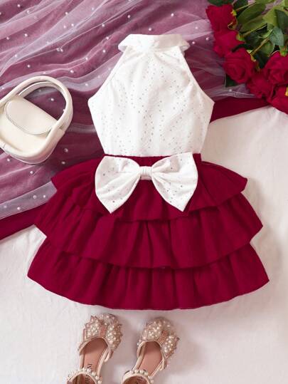 SHEIN Top De Cuello Halter Bordado Con Ojales Para Chicas Jóvenes Y Falda De Dos Capas Con Lazo Delantero En El Dobladillo