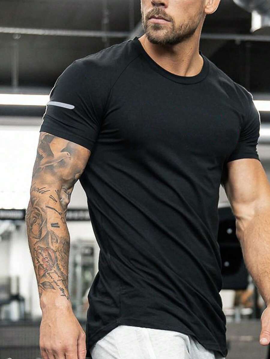 Manfinity Running Playera deportiva para hombres con mangas raglán para entrenamiento - Negro - Ver 1