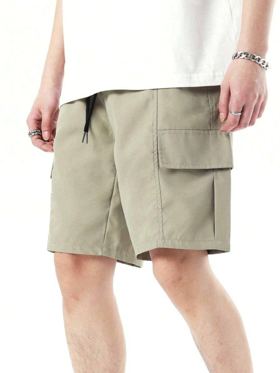 Manfinity Hypemode 男款鬆身貨物短褲,帶有翻蓋口袋和側邊束帶腰部 - 薄荷綠 - 查看 1