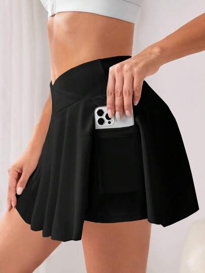 Easithlete Falda-pantalón deportiva de cintura alta de color sólido con bolsillo para teléfono