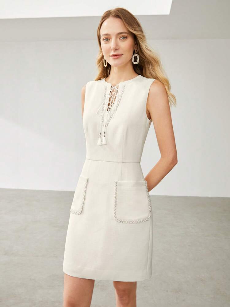 LACE-UP TASSEL POCKET DRESS