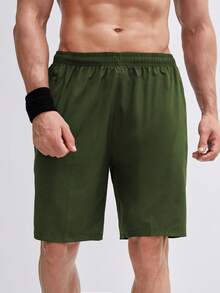 Manfinity Sport Corelite Hombres Shorts deportivos con bolsillo con cremallera - Verde militar - Ver 5