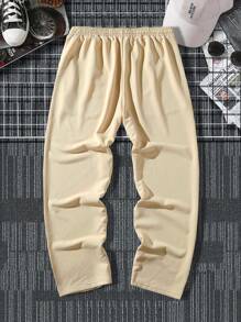 Manfinity Hypemode Men's Loose Fit Sweatpants With Slogan Graphic And Drawstring Waist - Khaki - View 2