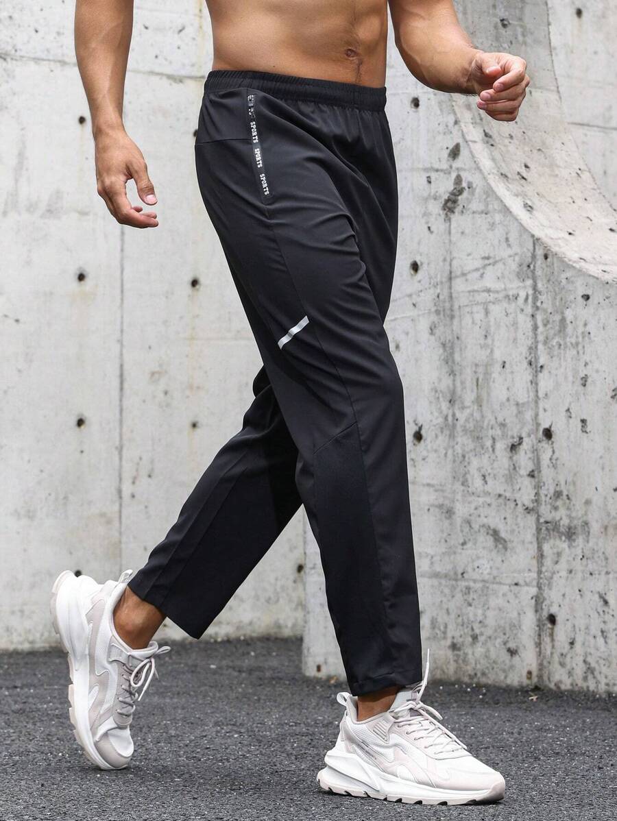 Manfinity Fitness Men Letter Graphic Sports Trousers - Black - View 1