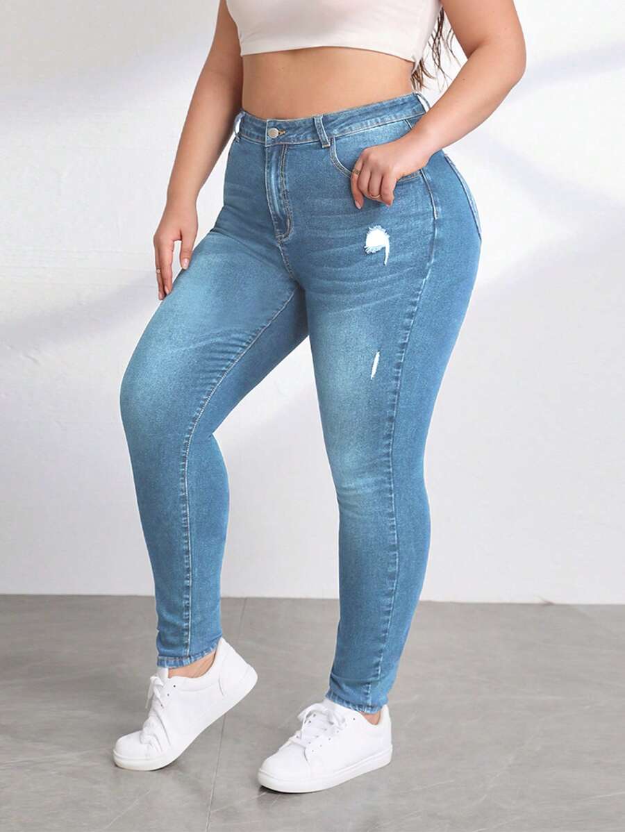 SHEIN Essnce Jeans ajustados desgarro