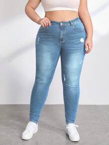 SHEIN Essnce Jeans ajustados desgarro