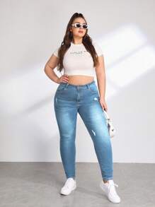 SHEIN Essnce Jeans ajustados desgarro