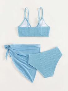 少女纯色比基尼套装搭配沙滩裙夏日海滩