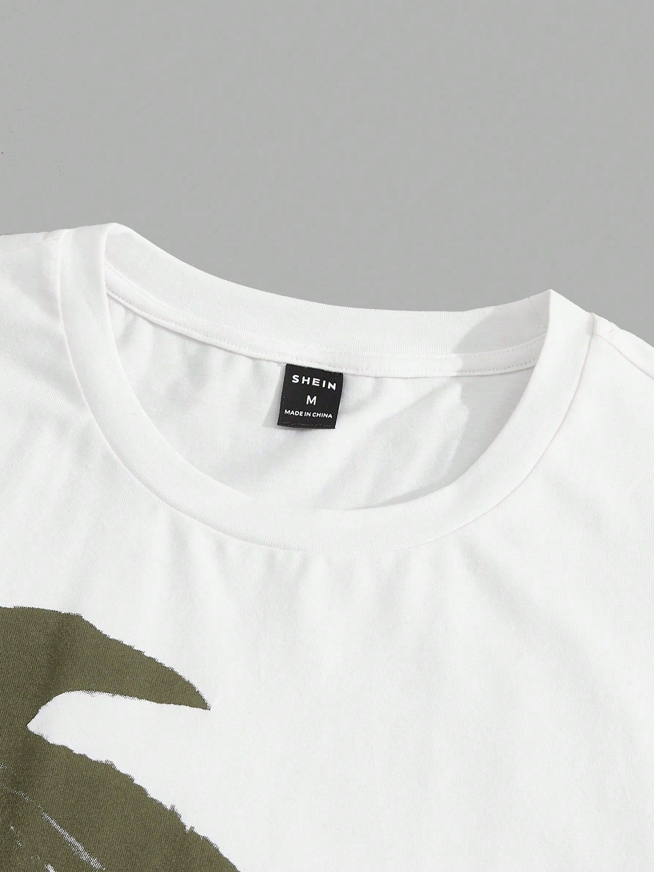 Manfinity BRENVOR بنطلون قطني مع رسم طائر نسر وطبا...