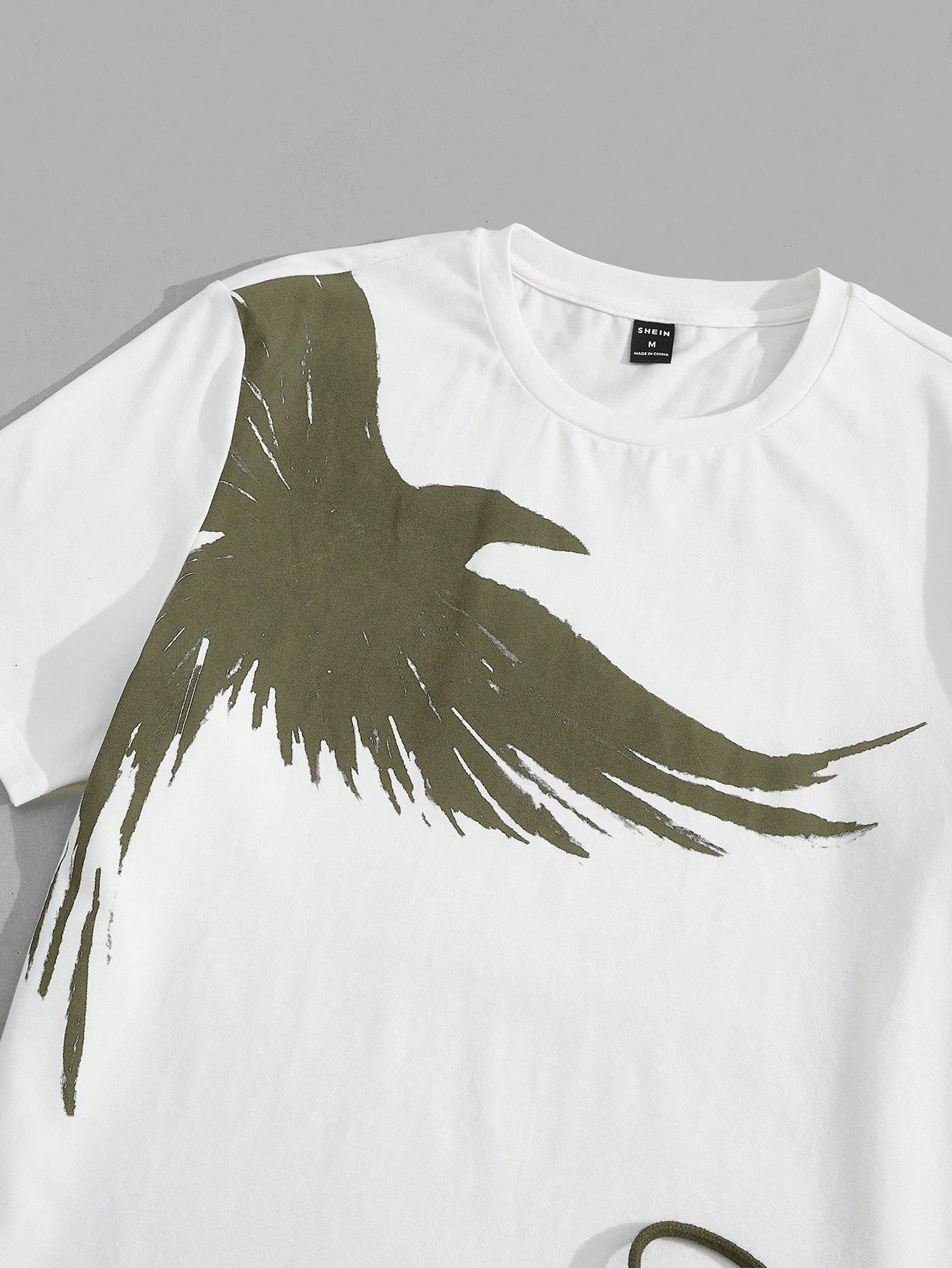 Manfinity BRENVOR بنطلون قطني مع رسم طائر نسر وطبا...