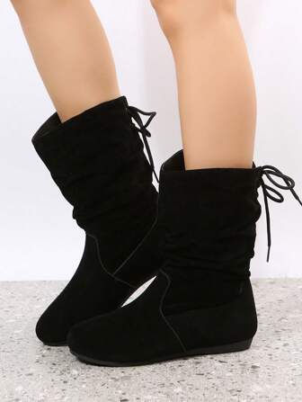Botas negras elegantes para mujer de otoño/invierno, botas holgadas con cordones y decoración de gamuza sintética, combinan con falda negra