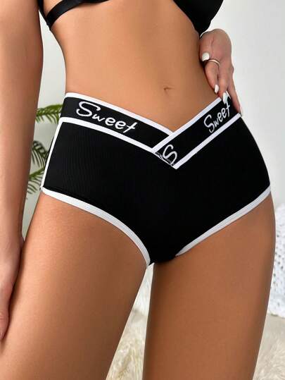 字母圖形撞色拼接不對稱腰型男式短褲，適用於運動