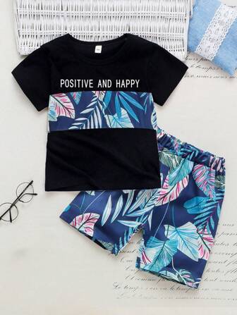 شورت مع تي شيرت بطباعة استوائي وعبارة للاولاد الصغار