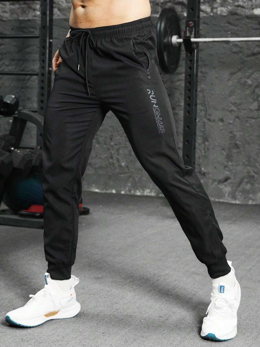 Manfinity Fitness Men Letter Graphic Drawstring Waist Sports Trousers - Black - View 1