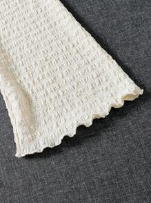 SHEIN Girls Crisscross Lettuce Trim Tee & Flare Leg Pants Set