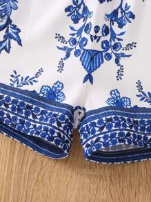 SHEIN Young Girl Floral Print Puff Sleeve Shirred Romper