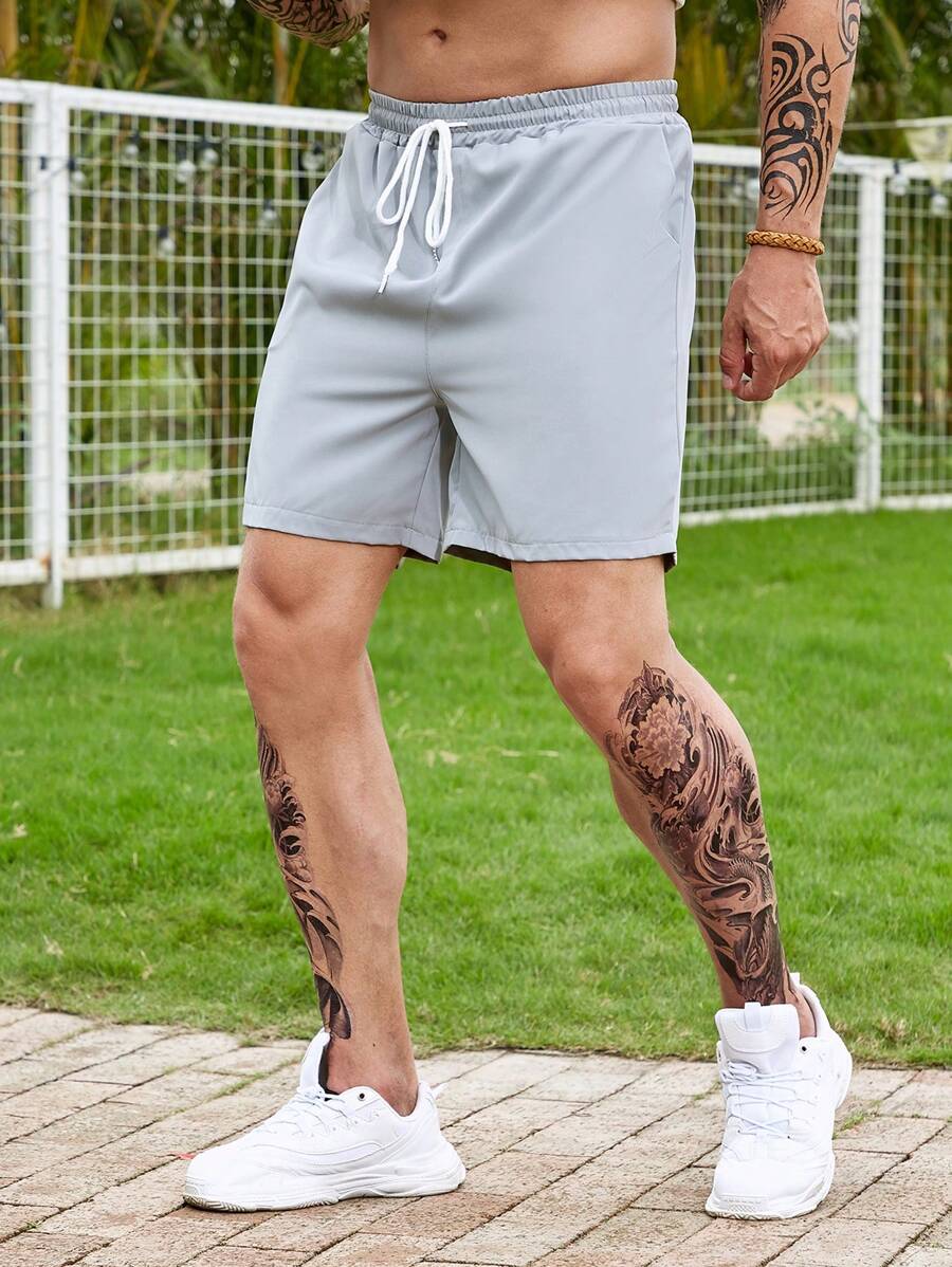 Manfinity Homme Hombres Shorts unicolor de cintura con cordón