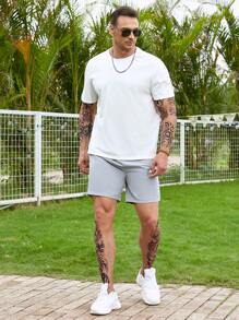 Manfinity Homme Hombres Shorts unicolor de cintura con cordón