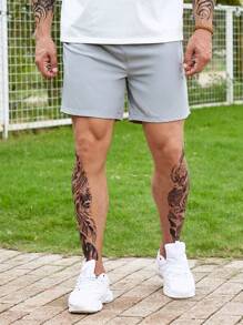 Manfinity Homme Hombres Shorts unicolor de cintura con cordón