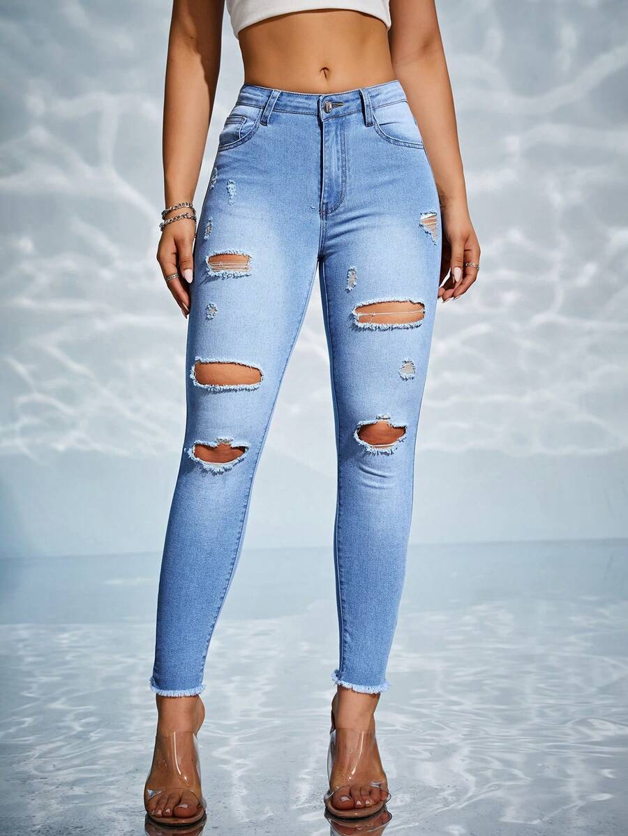 SHEIN Essnce Ripped Raw Hem Ripped Skinny Jeans - Light Wash - View 1