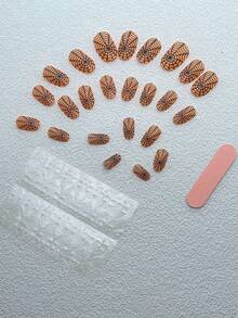 用萬聖節24入組短橢圓形蜘蛛網橙色印花假指甲和1張膠帶和1入組指甲銼打造迷人魅力 - 亮橙色 - 查看 2