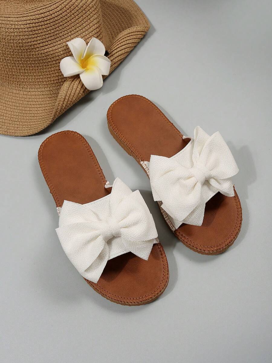 slippers with bow tie