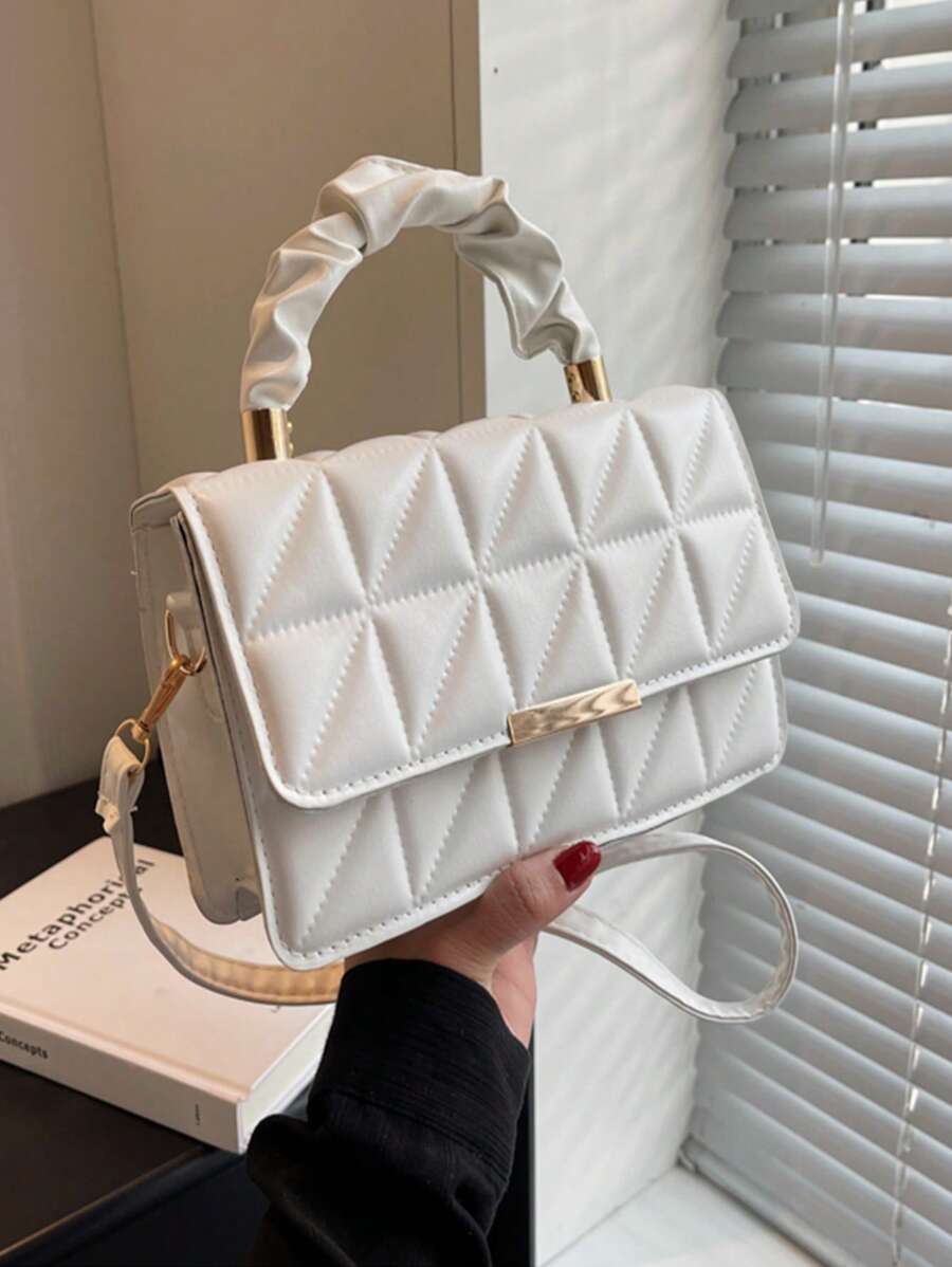 時尚的女士單色菱形圖案可摺疊手提包,帶拉練和褶皺設計,可當做肩背包或斜跨包使用,採用pu皮革製成