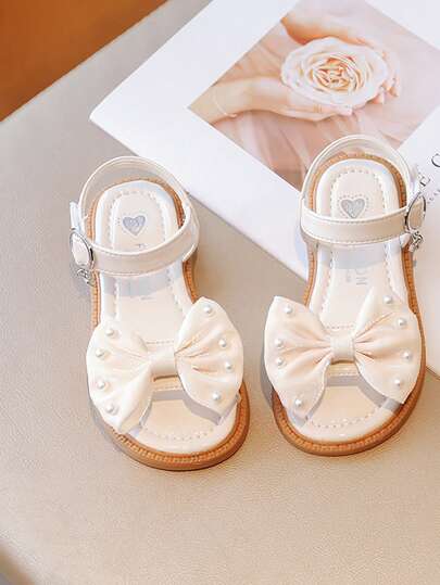 女孩人造珍珠和蝴蝶結裝飾踝帶平底涼鞋適用於戶外