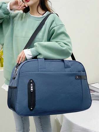 撞色旅行包雙把手時尚風格