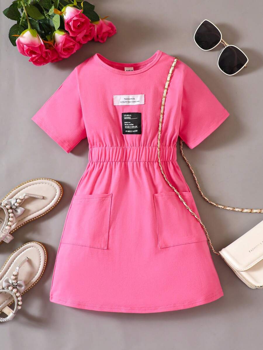 Đầm bé gái Đắp vá Túi Slogan Giải trí - Màu Hồng Tươi - Xem 1