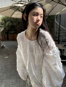 Camisa amplia unicolor de hombros caídos