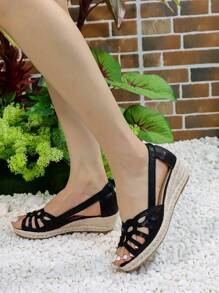 时尚女士金色镂空透气草绳一脚蹬坡跟凉鞋，休闲度假风格