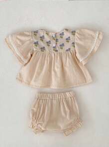 Ropa de verano nueva estilo para bebé de 0-3 años, bonita y de moda blusa de manga corta con manga de campana y dobladillo de volantes y pantalones cortos para niña - Albaricoque - Ver 2