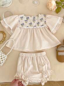 Ropa de verano nueva estilo para bebé de 0-3 años, bonita y de moda blusa de manga corta con manga de campana y dobladillo de volantes y pantalones cortos para niña - Albaricoque - Ver 3