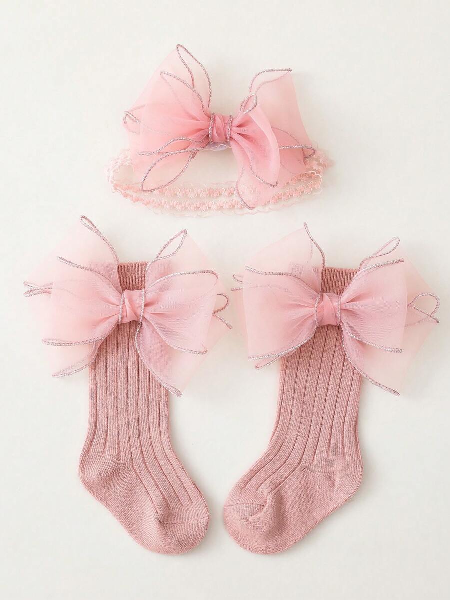 1雙女孩蝴蝶結裝飾長筒襪和1入組髮帶