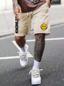 Manfinity EMRG 寬鬆男士卡通和字母圖案印花短褲,帶拉繩腰帶