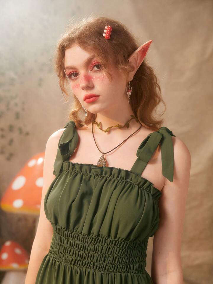 Our Fairycore Solid Tie Shoulder Shirred Ruffle Hem Cami Dress is