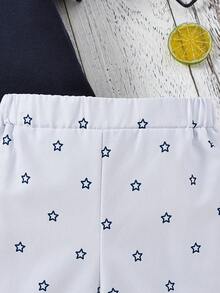 小男童翅膀印花拼接邊POLO衫和短褲