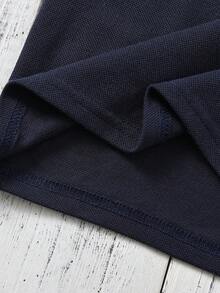 小男童翅膀印花拼接邊POLO衫和短褲