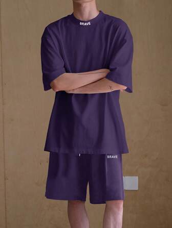 Ensemble De T-shirt À Épaules Basses Pour Homme À Graphique De Lettres Et De Shorts À Taille À Cordon De Serrage Pour Un Ajustement Ample