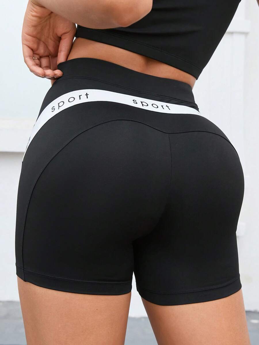 SHEIN Yoga Futuristic Letter Graphic Contrast Panel Sports Shorts - Black - View 1