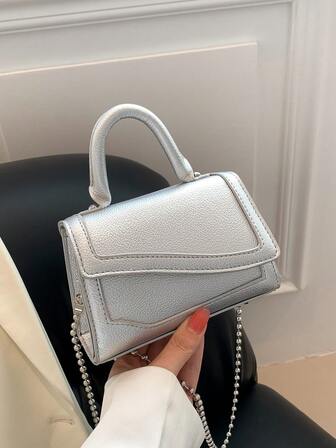 迷你金屬質感翻蓋方包前衛風格頂部單條提帶