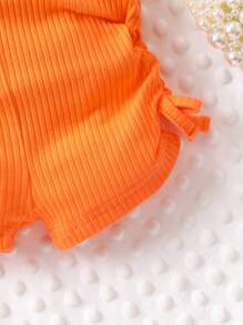 Mono De Tirantes Con Lazo Fruncido Para Bebé Niña - Naranja - Ver 3