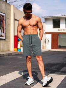 Manfinity Sport Corelite Pantaloncini casual da uomo stile boyfriend con coulisse in vita, tasche con cerniera, pantaloncini da allenamento, pantaloncini grigi da palestra