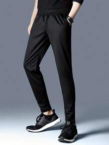 Running Men Solid Slant Pocket Sports Trousers - Black - View 1