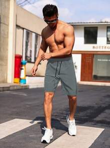 Manfinity Sport Corelite Pantaloncini casual da uomo stile boyfriend con coulisse in vita, tasche con cerniera, pantaloncini da allenamento, pantaloncini grigi da palestra