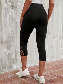 EMERY ROSE Leggings con tira cruzada bajo capri
