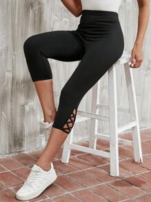 EMERY ROSE Leggings con tira cruzada bajo capri